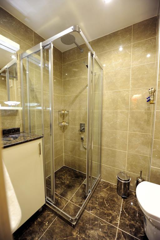 Rooms Inn Taxim Стамбул Номер фото