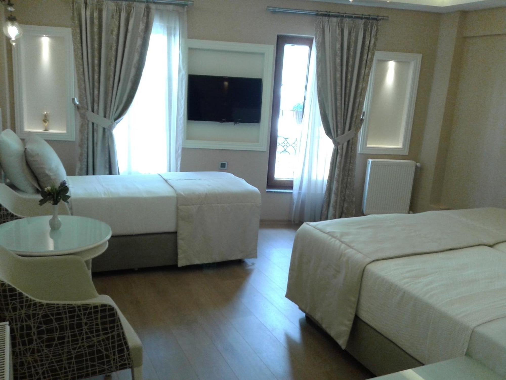 Rooms Inn Taxim Стамбул Номер фото
