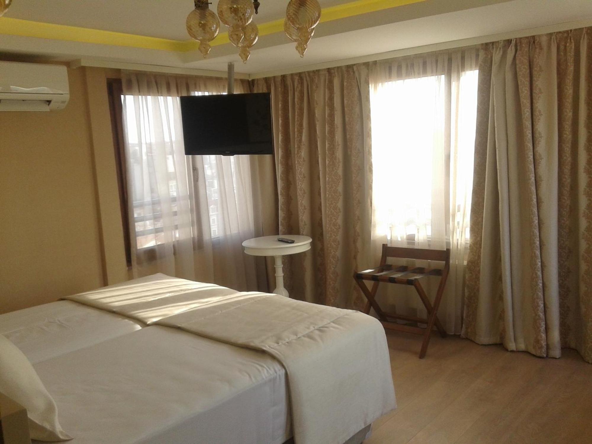 Rooms Inn Taxim Стамбул Номер фото